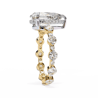 Pear Cut Lab Grown Diamond Side Stone Engagement Ring with Spaced Round Eternity Band