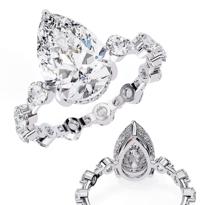 Pear Cut Lab Grown Diamond Side Stone Engagement Ring with Spaced Round Eternity Band