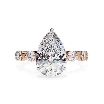 Pear Cut Lab Grown Diamond Side Stone Engagement Ring with Spaced Round Eternity Band