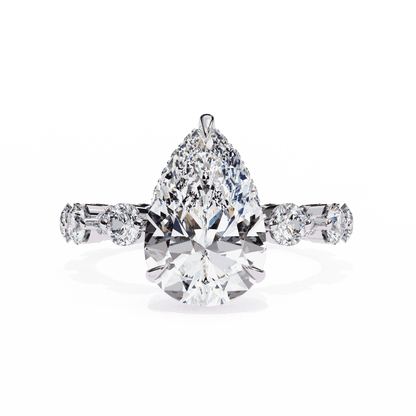 Pear Cut Lab Grown Diamond Side Stone Engagement Ring with Spaced Round Eternity Band
