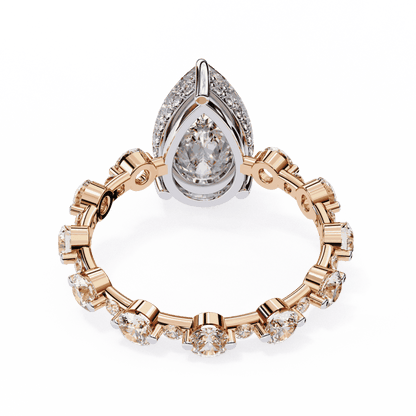 Pear Cut Lab Grown Diamond Side Stone Engagement Ring with Spaced Round Eternity Band