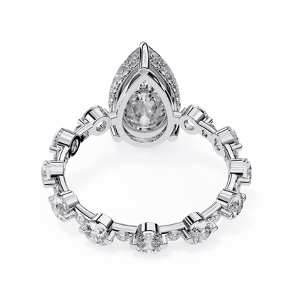 Pear Cut Lab Grown Diamond Side Stone Engagement Ring with Spaced Round Eternity Band
