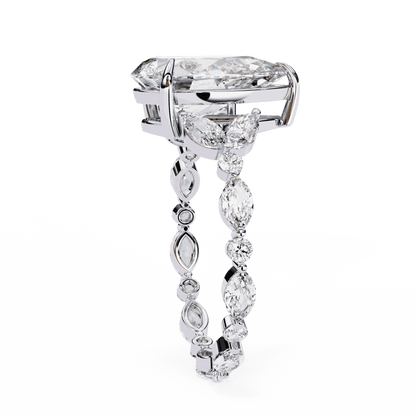 Pear Cut Lab Grown Diamond Side Stone Engagement Ring with Marquise and Round Eternity Band