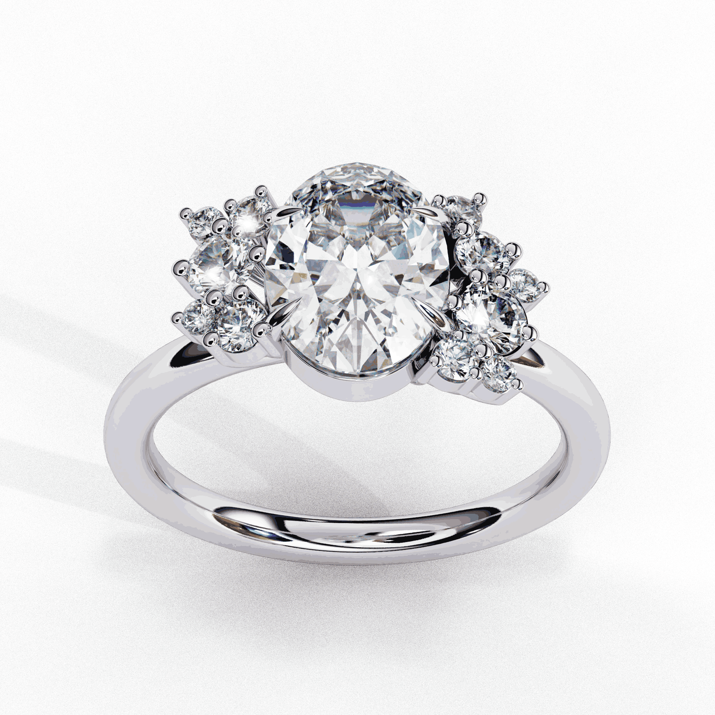 Oval Cut Lab Grown Diamond Bezel Engagement Ring with Asymmetric Diamond Cluster Accents