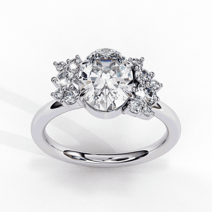 Oval Cut Lab Grown Diamond Bezel Engagement Ring with Asymmetric Diamond Cluster Accents
