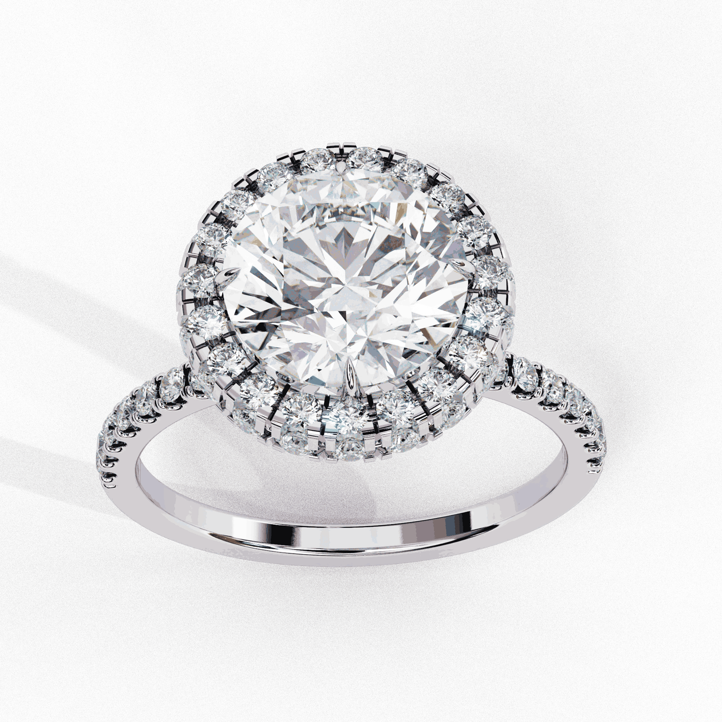 Round Cut Lab Grown Diamond Halo Engagement Ring with Open Gallery Pavé Basket