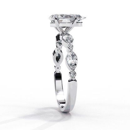 Pear Cut Lab Grown Diamond Pave Engagement Ring with Marquise and Round Accent Shoulders
