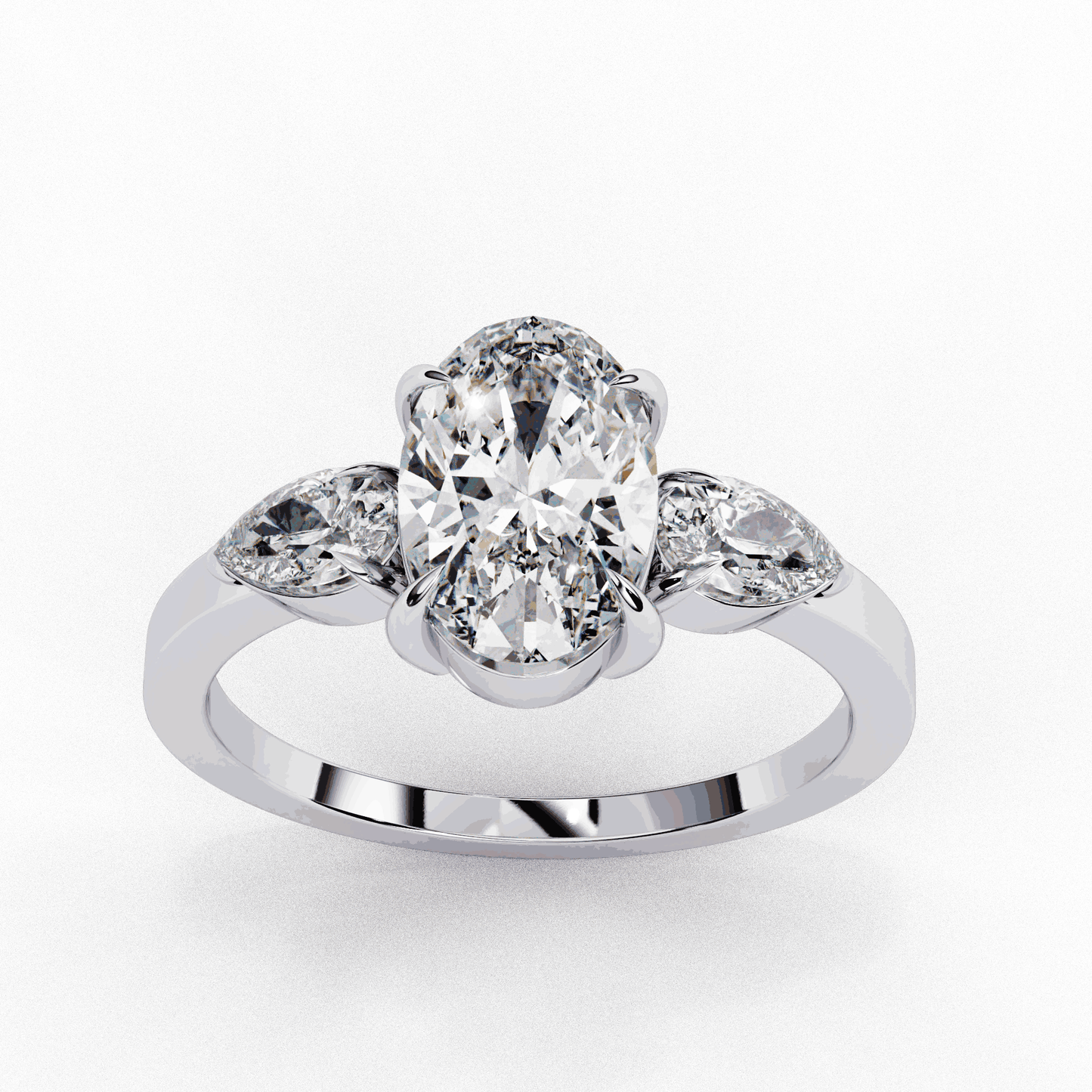 Oval Cut Lab Grown Diamond Three Stone Engagement Ring with Pear Side Accents