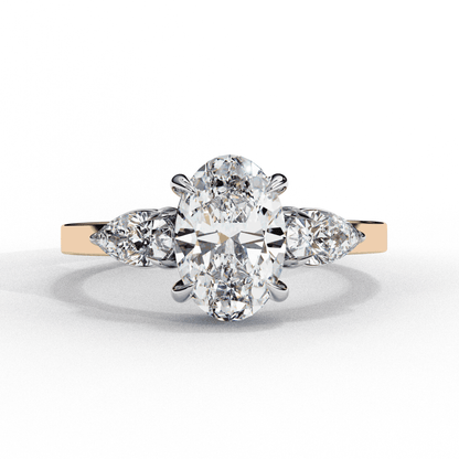 Oval Cut Lab Grown Diamond Three Stone Engagement Ring with Pear Side Accents