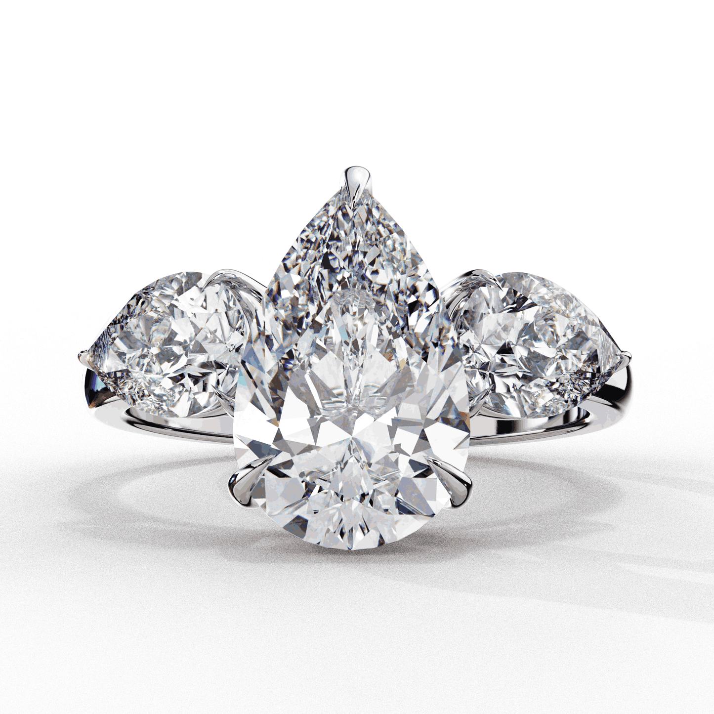Pear Cut Lab Grown Diamond Three Stone Engagement Ring with Pear Side Stones
