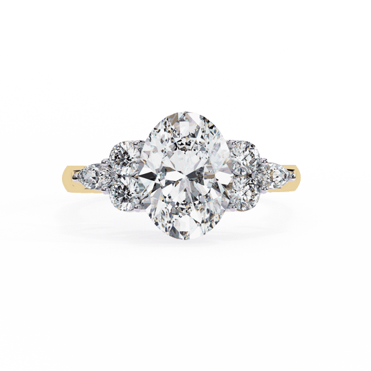 Oval Cut Lab Grown Diamond Side Stone Engagement Ring with Round and Pear Cluster Accents